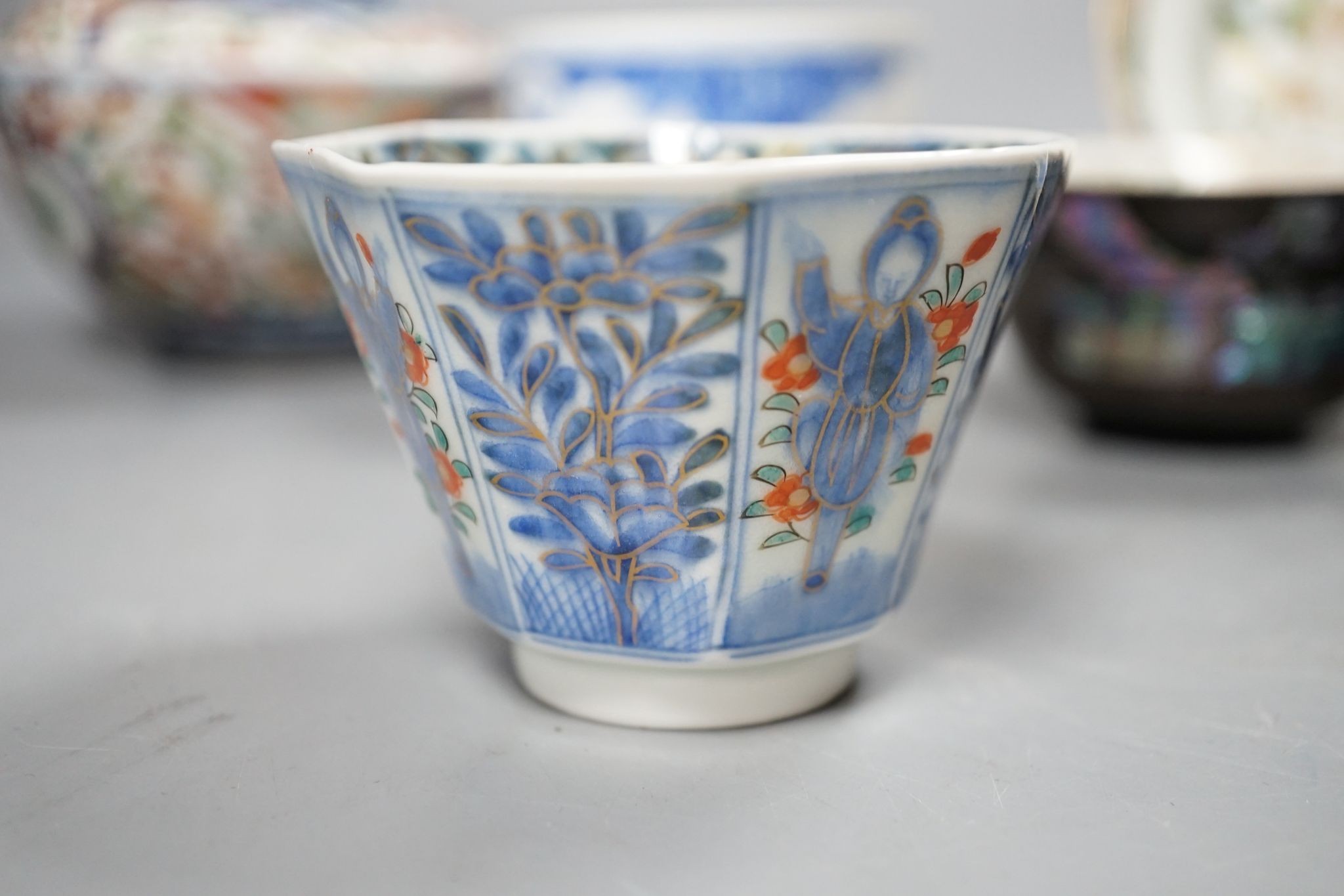 A group of Japanese porcelain tea wares and a rice bowl and cover